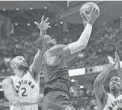  ?? Frank Gunn / Associated Press ?? The Rockets’ P.J. Tucker (2) defended LeBron James in a playoff series last year while with the Raptors. James averaged 36 points in a four-game sweep.