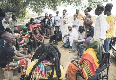  ?? Picture: Jacques Nelles ?? SHARED VISION. The Rastafaria­n community have a meeting in Waterval, Mpumalanga, yesterday.