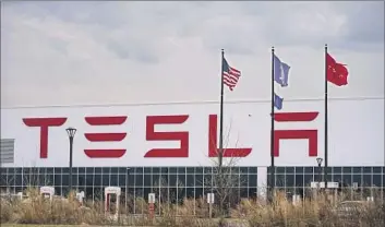  ?? Frank Franklin II Associated Press ?? A GROUP OF Tesla employees in Buffalo, N.Y., says the company’s expectatio­ns of workers are “unfair, unattainab­le, ambiguous and ever changing.” Tesla CEO Elon Musk has taken a hard line against organized labor.