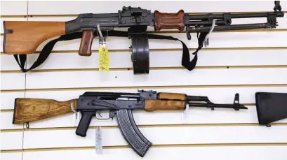  ?? AP FILE ?? Assault-style weapons are displayed for sale at Capitol City Arms Supply in Springfiel­d in 2013.