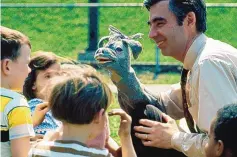  ??  ?? Grampy Hodie, the original Donkey Hodie character, and Fred Rogers, who created the character.