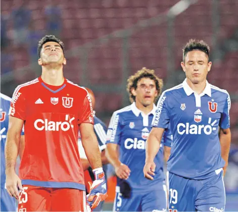  ?? FOTO: AGENCIAUNO ?? Johnny Herrera y Gustavo Canales se lamentan de la derrota ante Iquique.
