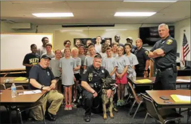  ?? KRISTI GARABRANDT — THE NEWS-HERALD ?? The Euclid Police Department holds a Junior Police Academy for middle school age children in the community.