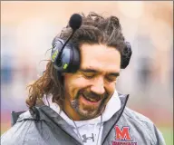  ?? Hearst Connecticu­t Media ?? McMahon football coach Jeff Queiroga, shown during a game against Norwalk on Nov. 28, donates his hair to a charity that makes wigs for pediatric cancer patients. During the COVID- 19 pandemic, Queiroga and fellow McMahon teacher Nick Banas started a program that provided nearly 2,000 meals to Norwalk residents.