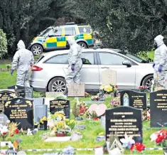  ??  ?? chemical experts at the graveyard where Sergei Skripal’s wife is buried