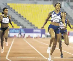  ?? (Photo: AFP) ?? Jamaica’s Elaine Thompson-herah (second right) wins the women’s 100m during the IAAF Diamond League competitio­n yesterday at the Suheim Bin Hamad Stadium in the Qatari capital Doha.