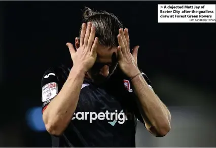  ?? Tom Sandberg/PPAUK ?? > A dejected Matt Jay of Exeter City after the goalless draw at Forest Green Rovers