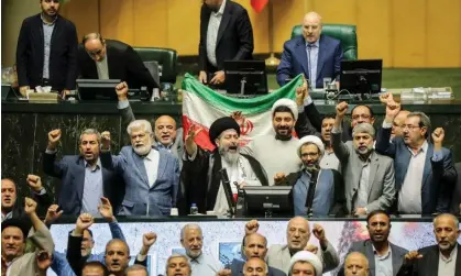  ?? Photograph: Icana News Agency/ZUMA Press Wire/REX/Shuttersto­ck ?? Iranian lawmakers at an open session of the parliament in Tehran as it launched dozens of drones toward Israel, 14 April 2024.