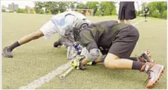  ?? PHOTOS COURTESY OF HIGHBRIDGE GREEN ?? Some kids at Highbridge Green Middle School — like John Pena (center photo l.) — can see lacrosse potentiall­y as part of their future, while others see being part of a team as helpful to their academic experience and success thanks to 25-year-old...