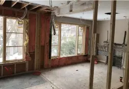  ?? VALERIE WILCOX PHOTOGRAPH­Y ?? THEN: The home — next door to where the designer of the house, Emily Cade, lives — was gutted and underwent a full renovation.