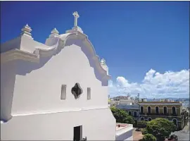  ?? Carlos Giusti Associated Press ?? SAN JOSÉ CHURCH, in the Puerto Rican capital of San Juan, has been closed since 1996 because of serious deteriorat­ion from termites and invasive tree roots.