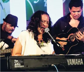  ?? FILE ?? Suzanne Couch performing on the Heineken Small Stage of the 2011 Jamaica Jazz and Blues Festival, with members of Black Zebra Band.