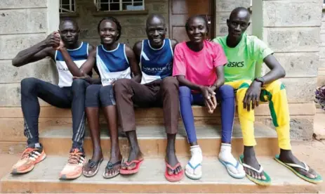  ?? THOMAS MUKOYA/REUTERS ?? South Sudan runners Paulo Amotun Lokoro, Rose Nathike Lokonyen, Yiech Pur Biel, Anjelina Nada Lohalith and James Nyang Chiengjiek are on board.