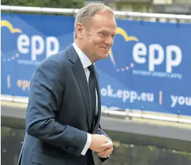  ?? /Reuters ?? Bone of contention: Donald Tusk, who was reappointe­d as president of the European Council on Thursday, arrives at a European People’s Party meeting ahead of the EU summit in Brussels.