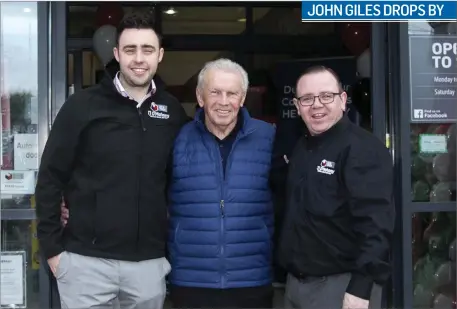  ??  ?? Sean Adams and Patrick Bracken with Irish soccer legend John Giles at the offical opening of TJ O’Mahony’s in Arklow last Friday.