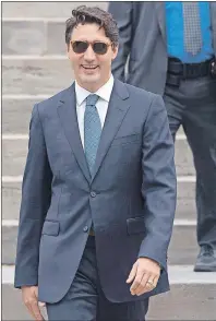  ?? CP PHOTO ?? Prime Minister Justin Trudeau arrives for a media availabili­ty at the National Press Theatre in Ottawa on Tuesday.