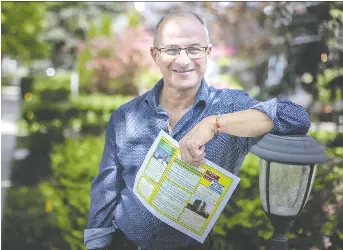  ?? DAX MELMER ?? Giovanni Abati, independen­t candidate for Windsor-tecumseh, pauses Friday while handing out his campaign literature on Argyle Road. Abati wants to see wetlands and other natural areas protected.