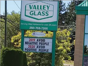  ?? TheDailyCo­urier ?? A sign outside Valley Glass in Westbank offers some advice. It should be easy to do, as less than one-tenth of one per cent of people in the Okanagan has tested positive for COVID-19.