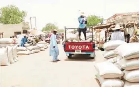  ?? ?? There are weekly market days for each major towns along the road like this one at Malam Madori on Tuesdays