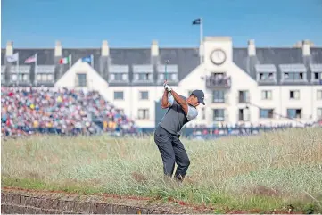  ?? ?? ROUGH TIME: Tiger Woods’ approach shot on Carnoustie’s 18th hole at the 2018 Open.