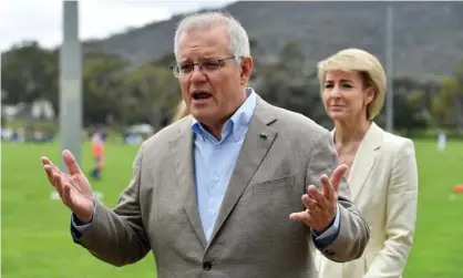  ?? Photograph: Mick Tsikas/AAP ?? Scott Morrison and Michaelia Cash at a press conference in Canberra on Sunday. The PM said the Coalition would proceed with its muchcritic­ised model of a federal anti-corruption commission.