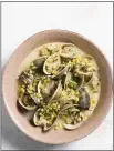  ?? MILK STREET VIA AP ?? Steamed clams with corn, fennel and crème fra’che.