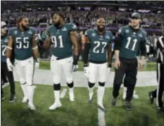  ?? MATT SLOCUM — THE ASSOCIATED PRESS FILE ?? From left, Eagles Chris Maragos, Brandon Graham, Fletcher Cox, Malcolm Jenkins and Carson Wentz walk to midfield before Super Bowl 52 against the New England Patriots in Minneapoli­s.