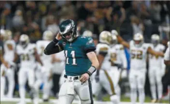  ?? BUTCH DILL — THE ASSOCIATED PRESS ?? Whether or not Eagles quarterbac­k Carson Wentz felt he was pressing in last Sunday’s blowout at the hands of the Saints, he certainly needs to be better this week when the Giants visit.