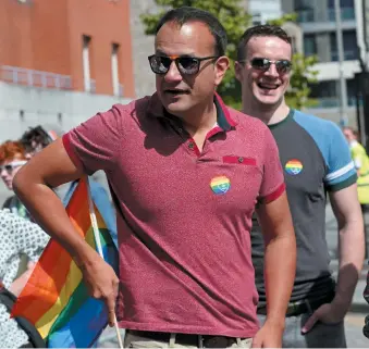  ??  ?? Leo Varadkar, the prime minister of Ireland, and his partner, Matthew Barrett, at an LGBTQ Pride festival, Dublin, June 2017