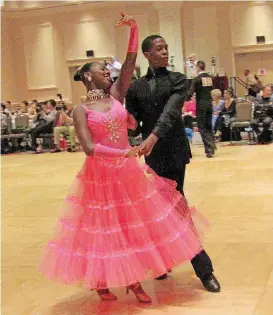  ?? [PHOTOS PROVIDED] ?? RIGHT: Reginald Larkins and Caitlyn Wilson, youth dance champions.