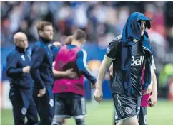  ??  ?? Vancouver’s Jordon Mutch, right, says there were no personalit­y problems with the team although something was lost when Carl Robinson left as coach.