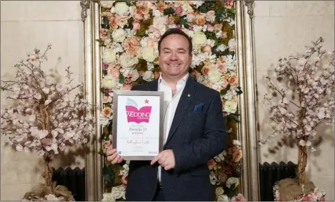  ??  ?? Bellingham Castle owner Patrick Corscadden accepted award for Unique Venue of the Year