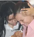  ??  ?? Schapelle Corby with her translator Eka Sulistiowa­ti during her trial.