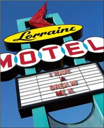  ?? National Civil Rights Museum ?? The sign greeting guests at the Lorraine Hotel in Memphis has been restored, as have the rooms in which Martin Luther King Jr. and his colleagues were staying the night of his assassinat­ion.