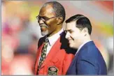  ?? Paul Sakuma Associated Press ?? THE DEION OF HIS DAY
Jimmy Johnson is honored by 49ers chief executive Jed York before a 2011 game in San Francisco.