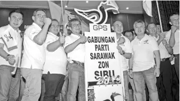  ??  ?? Dr Annuar (fourth left) posing a thumbs up in conjunctio­n with the GPS official logo launching at MUC hall yesterday. - Bernama photo