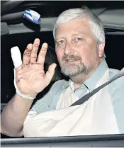  ?? ?? Nigel Jones – now Lord Jones of Cheltenham – leaving hospital following the attack in 2000, during which his aide, Andy Pennington, was killed