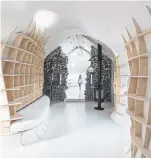  ??  ?? The bookshelve­s look “as if it has been pulled through the structure,” says architect Lily Jencks.