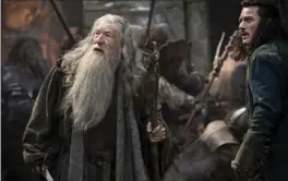  ?? MARK POKORNY, MCCLATCHY-TRIBUNE ?? From left, Ian McKellan (Gandalf ) and Luke Evans (Bard) in “The Hobbit: Battle of Five Armies.”