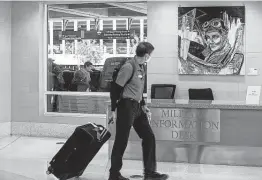  ?? ?? “The Pilot” is among the works of Giovanna DiZurita that hang in the baggage claim area in Terminal B.