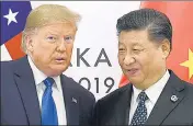  ?? AP/FILE ?? A file photo of US President Donald Trump (left) with Chinese President Xi Jinping during a G20 meeting.