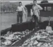  ?? COURTESY — VERMILION HISTORY MUSEUM ?? Sons of Tom Neiding of Neiding Fishery, Bryce and Tom, aboard a tug boat, taken in 1960.