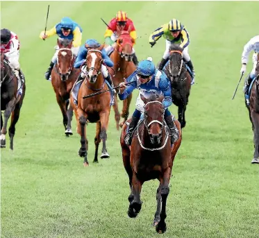  ?? GETTY IMAGES ?? Hugh Bowman and Winx have gone back-to-back in the Cox Plate with an astonishin­g eight length win.