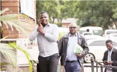  ?? ?? Advisor Makuyana (25) arrives at the Harare Magistrate­s Courts yesterday to face allegation­s of breaching the Data Protection Act