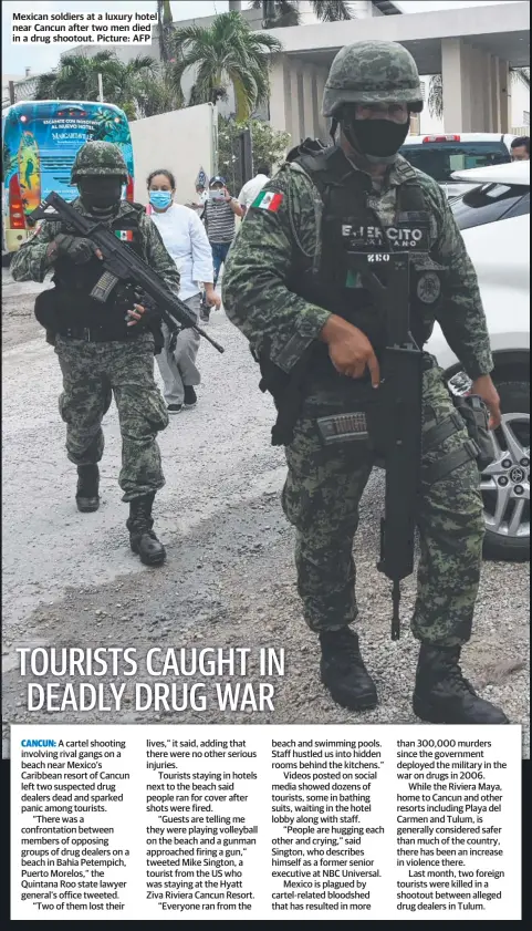  ?? ?? Mexican soldiers at a luxury hotel near Cancun after two men died in a drug shootout. Picture: AFP