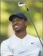  ?? Lee Jin-man / Associated Press ?? Tiger Woods watches his tee shot on the fifth hole during the second round of the Zozo Championsh­ip on Saturday.