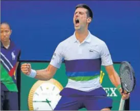  ?? AFP ?? Novak Djokovic celebrates a point against Kei Nishikori during their US Open third round.