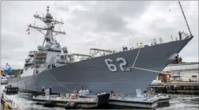  ?? PATRICK DIONNE/U.S. NAVY VIA AP ?? In this image provided by the U.S. Navy, the Arleigh Burke-class guided-missile destroyer USS Fitzgerald (DDG 62) pulls into Dry Dock 5 in Yokosuka, Japan on June 15, 2016. The U.S. military says the Navy destroyer collided with a merchant ship off the...