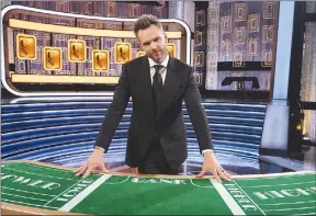  ??  ?? Joel McHale hosts “Card Sharks”