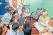  ?? PTI ?? BJP national president Amit Shah met the family members of an RSS worker who was killed in 2016, in Mysuru on Friday.